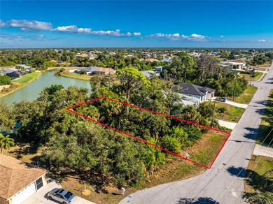 Make your Florida dream come true on this water view lot on a on Rotonda Golf and Country Club The Palms Course in Florida - for sale on GolfHomes.com, golf home, golf lot