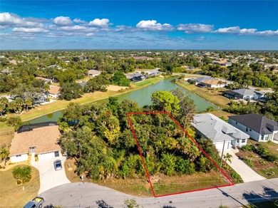 Make your Florida dream come true on this water view lot on a on Rotonda Golf and Country Club The Palms Course in Florida - for sale on GolfHomes.com, golf home, golf lot