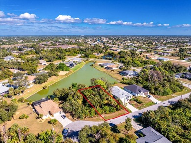 Make your Florida dream come true on this water view lot on a on Rotonda Golf and Country Club The Palms Course in Florida - for sale on GolfHomes.com, golf home, golf lot