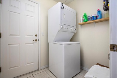 Waterfront POND lot with stunning water views! This 2-bedroom on Caloosa Greens Executive Golf Course in Florida - for sale on GolfHomes.com, golf home, golf lot