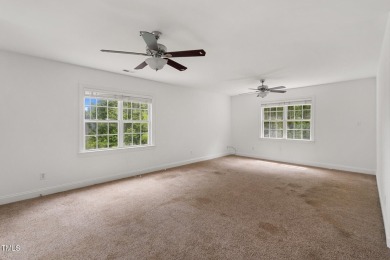 Welcome to this beautiful 2.5 story home on a private, wooded on The Neuse Golf Club in North Carolina - for sale on GolfHomes.com, golf home, golf lot