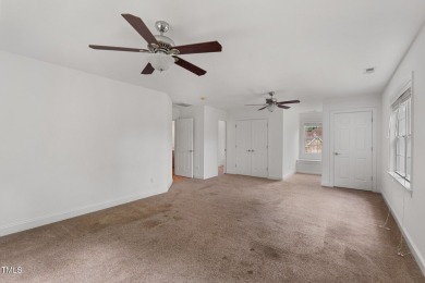 Welcome to this beautiful 2.5 story home on a private, wooded on The Neuse Golf Club in North Carolina - for sale on GolfHomes.com, golf home, golf lot