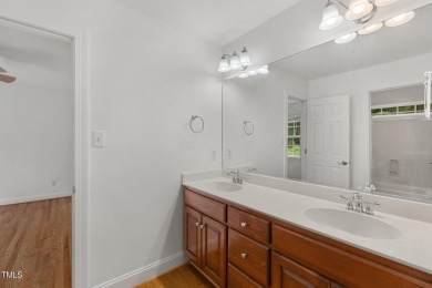 Welcome to this beautiful 2.5 story home on a private, wooded on The Neuse Golf Club in North Carolina - for sale on GolfHomes.com, golf home, golf lot