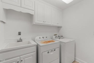 Welcome to this beautiful 2.5 story home on a private, wooded on The Neuse Golf Club in North Carolina - for sale on GolfHomes.com, golf home, golf lot