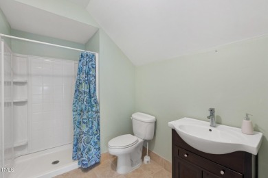 Welcome to this beautiful 2.5 story home on a private, wooded on The Neuse Golf Club in North Carolina - for sale on GolfHomes.com, golf home, golf lot