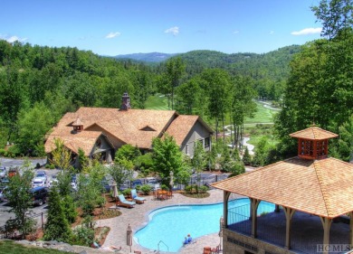 Nestled in the Turning Leaf condominium complex, this mountain on Old Edwards Club in North Carolina - for sale on GolfHomes.com, golf home, golf lot