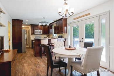 Experience the perfect blend of comfort and style in this on Lake Monterey Golf Club in Michigan - for sale on GolfHomes.com, golf home, golf lot