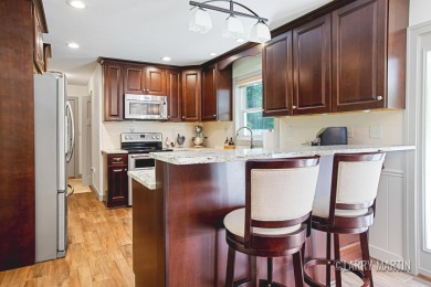 Experience the perfect blend of comfort and style in this on Lake Monterey Golf Club in Michigan - for sale on GolfHomes.com, golf home, golf lot