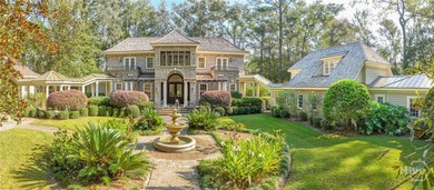 Tucked deep within the Ford Field & River Club, this estate on The Ford Field and River Club  in Georgia - for sale on GolfHomes.com, golf home, golf lot