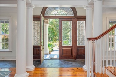 Tucked deep within the Ford Field & River Club, this estate on The Ford Field and River Club  in Georgia - for sale on GolfHomes.com, golf home, golf lot