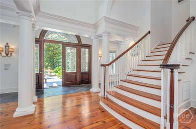 Tucked deep within the Ford Field & River Club, this estate on The Ford Field and River Club  in Georgia - for sale on GolfHomes.com, golf home, golf lot