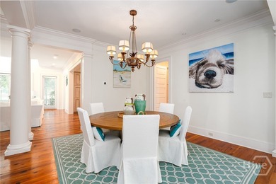 Tucked deep within the Ford Field & River Club, this estate on The Ford Field and River Club  in Georgia - for sale on GolfHomes.com, golf home, golf lot