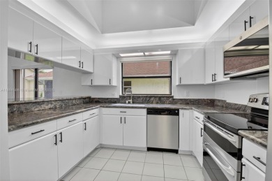 Beautiful two bedroom two and half bath single family home in on Boca Delray Golf and Country Club in Florida - for sale on GolfHomes.com, golf home, golf lot