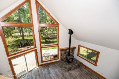Beautiful year-round cedar home in the desirable Shady Pines on Priest Lake Golf and Tennis Club in Idaho - for sale on GolfHomes.com, golf home, golf lot