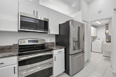 Beautiful two bedroom two and half bath single family home in on Boca Delray Golf and Country Club in Florida - for sale on GolfHomes.com, golf home, golf lot
