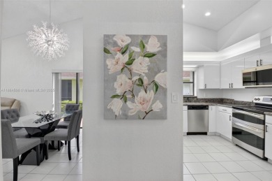 Beautiful two bedroom two and half bath single family home in on Boca Delray Golf and Country Club in Florida - for sale on GolfHomes.com, golf home, golf lot