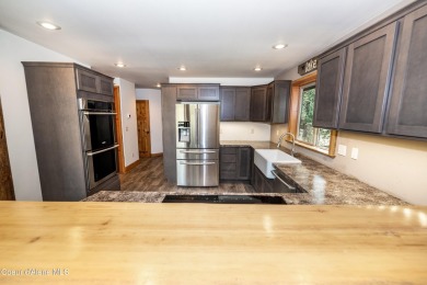 Beautiful year-round cedar home in the desirable Shady Pines on Priest Lake Golf and Tennis Club in Idaho - for sale on GolfHomes.com, golf home, golf lot