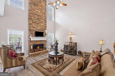 CUSTOM MODEL HOME with RICH UPGRADES and NEW FLOORING AND on Sugar Hill Golf Club in Georgia - for sale on GolfHomes.com, golf home, golf lot