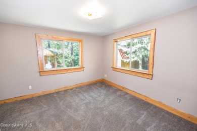 Beautiful year-round cedar home in the desirable Shady Pines on Priest Lake Golf and Tennis Club in Idaho - for sale on GolfHomes.com, golf home, golf lot