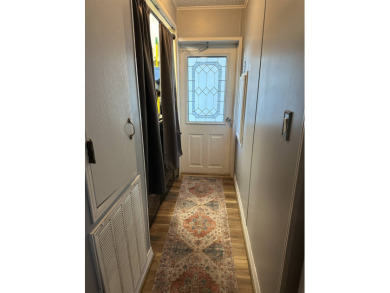 This charming 1996 2-bedroom Palm Harbor home is a must-see! on Schalamar Creek Golf and Country Club in Florida - for sale on GolfHomes.com, golf home, golf lot