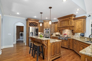 Welcome to this exceptional Rivercut estate on beautiful on Rivercut Golf Course in Missouri - for sale on GolfHomes.com, golf home, golf lot
