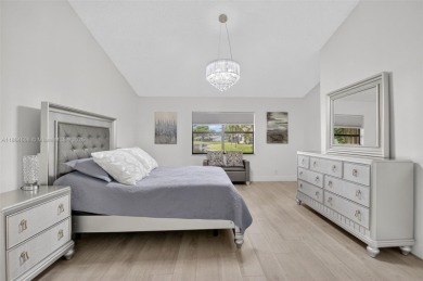 Beautiful two bedroom two and half bath single family home in on Boca Delray Golf and Country Club in Florida - for sale on GolfHomes.com, golf home, golf lot