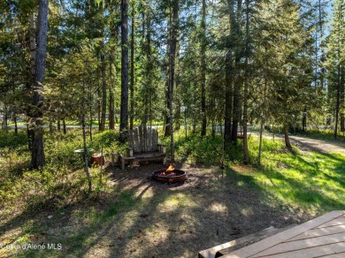 Beautiful year-round cedar home in the desirable Shady Pines on Priest Lake Golf and Tennis Club in Idaho - for sale on GolfHomes.com, golf home, golf lot