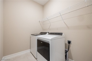 THIS HOME IS THE LOWEST PRICED OVERSIZED LOT HOMES IN THE on River Hall Country Club in Florida - for sale on GolfHomes.com, golf home, golf lot
