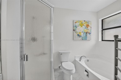 Beautiful two bedroom two and half bath single family home in on Boca Delray Golf and Country Club in Florida - for sale on GolfHomes.com, golf home, golf lot