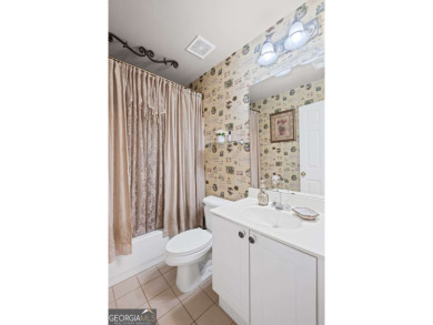 CUSTOM MODEL HOME with RICH UPGRADES and NEW FLOORING AND on Sugar Hill Golf Club in Georgia - for sale on GolfHomes.com, golf home, golf lot