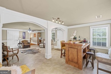 CUSTOM MODEL HOME with RICH UPGRADES and NEW FLOORING AND on Sugar Hill Golf Club in Georgia - for sale on GolfHomes.com, golf home, golf lot