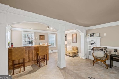CUSTOM MODEL HOME with RICH UPGRADES and NEW FLOORING AND on Sugar Hill Golf Club in Georgia - for sale on GolfHomes.com, golf home, golf lot