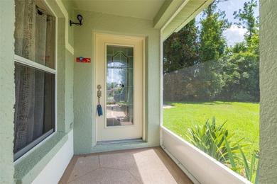 A COZY SPLIT 3-BEDROOM, 2-BATHROOM, 2-CAR GARAGE HOME LOCATED ON on Tampa Bay Golf and Country Club in Florida - for sale on GolfHomes.com, golf home, golf lot