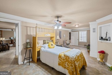 CUSTOM MODEL HOME with RICH UPGRADES and NEW FLOORING AND on Sugar Hill Golf Club in Georgia - for sale on GolfHomes.com, golf home, golf lot