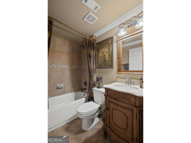 CUSTOM MODEL HOME with RICH UPGRADES and NEW FLOORING AND on Sugar Hill Golf Club in Georgia - for sale on GolfHomes.com, golf home, golf lot