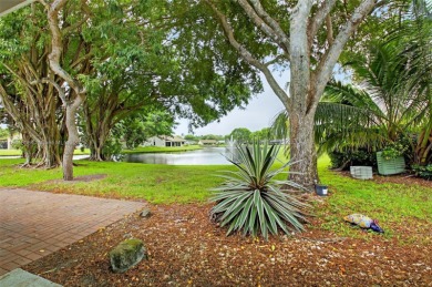 Beautiful two bedroom two and half bath single family home in on Boca Delray Golf and Country Club in Florida - for sale on GolfHomes.com, golf home, golf lot
