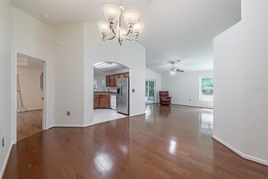 A COZY SPLIT 3-BEDROOM, 2-BATHROOM, 2-CAR GARAGE HOME LOCATED ON on Tampa Bay Golf and Country Club in Florida - for sale on GolfHomes.com, golf home, golf lot