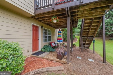 CUSTOM MODEL HOME with RICH UPGRADES and NEW FLOORING AND on Sugar Hill Golf Club in Georgia - for sale on GolfHomes.com, golf home, golf lot
