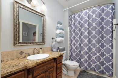 Welcome to this exceptional Rivercut estate on beautiful on Rivercut Golf Course in Missouri - for sale on GolfHomes.com, golf home, golf lot