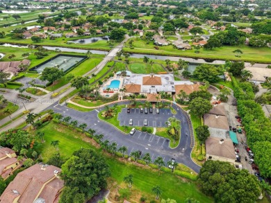 Beautiful two bedroom two and half bath single family home in on Boca Delray Golf and Country Club in Florida - for sale on GolfHomes.com, golf home, golf lot