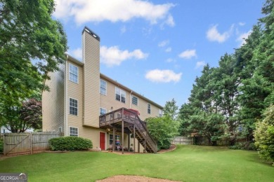 CUSTOM MODEL HOME with RICH UPGRADES and NEW FLOORING AND on Sugar Hill Golf Club in Georgia - for sale on GolfHomes.com, golf home, golf lot
