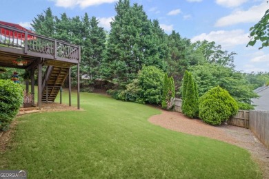 CUSTOM MODEL HOME with RICH UPGRADES and NEW FLOORING AND on Sugar Hill Golf Club in Georgia - for sale on GolfHomes.com, golf home, golf lot