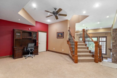 Welcome to this exceptional Rivercut estate on beautiful on Rivercut Golf Course in Missouri - for sale on GolfHomes.com, golf home, golf lot