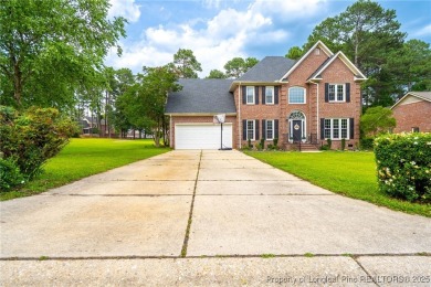 Welcome to your dream home on the scenic Kings Grant Golf Course on Kings Grant Golf and Country Club in North Carolina - for sale on GolfHomes.com, golf home, golf lot
