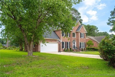Welcome to your dream home on the scenic Kings Grant Golf Course on Kings Grant Golf and Country Club in North Carolina - for sale on GolfHomes.com, golf home, golf lot