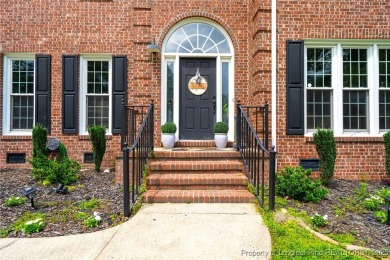 Welcome to your dream home on the scenic Kings Grant Golf Course on Kings Grant Golf and Country Club in North Carolina - for sale on GolfHomes.com, golf home, golf lot
