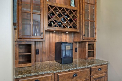 Welcome to this exceptional Rivercut estate on beautiful on Rivercut Golf Course in Missouri - for sale on GolfHomes.com, golf home, golf lot