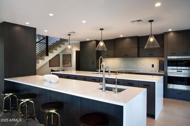 Frank Lloyd Wright inspired home built by Salcito and on Desert Highlands Golf Club in Arizona - for sale on GolfHomes.com, golf home, golf lot