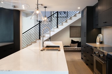 Frank Lloyd Wright inspired home built by Salcito and on Desert Highlands Golf Club in Arizona - for sale on GolfHomes.com, golf home, golf lot