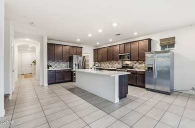 Beautifully upgraded home close to the lakes, yacht club & more on Estrella Mountain Ranch Golf Course in Arizona - for sale on GolfHomes.com, golf home, golf lot